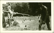 View of Camp Hutzler swimmers in the Patapsco River. Established by Albert and Joel Hutzler, of the Baltimore-based Hutzler's department store, the camp ran from 1921 to 1923. From July through September, employees of Hutzler's could go to the camp, located in the Patapsco Forest Preserve in Ellicott City, Maryland, and enjoy leisure time with…