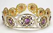This diadem of amethysts and pearls was given to Elizabeth Patterson Bonaparte (1785-1879) by Jerome Bonaparte (1784-1860). It was part of a larger set containing earrings, a bracelet, a pendant and additional amethysts that were set into a bracelets in London. In 1869, Elizabeth records, "This Parure sent 1805 by Prince Jerome." Jerome probably sent…