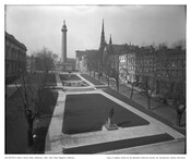 View looking west-northwest from the upper floor of a building in the 600 block of St. Paul Street in Baltimore, Maryland. East Mount Vernon Place and buildings are pictured on the north side in foreground; Peabody Institute, Washington Monument, and Mount Vernon Place United Methodist Church are seen in background.