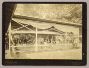 View of children riding a carousel at the Tolchester Beach Amusement Park in Tolchester, Maryland. The Kent County park consisted of a bathing beach, amusement park, racetrack, and hotel, and was in operation from 1877 to 1962. It was a popular vacation destination for Baltimoreans as it was only 27 miles across the Chesapeake Bay…