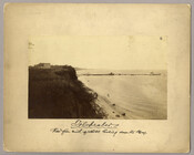 View of hotel and pier on the Chesapeake Bay in Tolchester, Maryland. Tolchester was the site of the Tolchester Beach Amusement Park, which consisted of a bathing beach, amusement park, racetrack, and hotel, and was in operation from 1877 to 1962. The Kent County park was a popular vacation destination for Baltimoreans as it was…