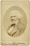 A carte de visite portrait of abolitionist Frederick Douglass, taken by Boston based studio Warren's Portraits. Verso transcription: Warren's Portraits. 465 Washington St Boston