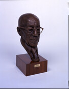 Bronze bust on a wooden block mount of Baltimore jazz musician James Hubert "Eubie" Blake (1887-1983) by artist Bobbiegita Walker (1942- ).