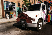 View of the front of the Club Hippo float truck at the Pride Parade in Baltimore, Maryland. A nightlife hotspot, Club Hippo was a safe haven for members of Baltimore’s LGBTQ+ community for over 40 years. The first Baltimore Pride was held in 1975 and consisted of activists coming together in a peaceful demonstration. Throughout…