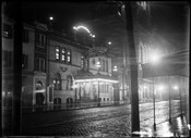 Street-level night view of the Auditorium Theater and Music Hall, located at 506 North Howard Street, near Franklin Street in Baltimore, Maryland. The first building on this site opened as The Natatorium in 1880 and was purchased by James L Kernan (1838-1912) in 1892. It was reopened as a vaudeville theater in 1903 and by…