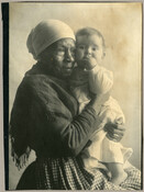 Portrait of Eliza Benson (1836-1921) holding Catherine Spencer Hayden (also known as "Kitty"), daughter of Baltimore, Maryland, photographer Emily Spencer Hayden. With the deaths of Emily's parents A. C. Bradford "Braddie" Harrison Spencer (1841–1882) and Edward Spencer (1834–1883) in the early 1880s, care of the younger Spencer children was left to Benson. A formerly enslaved…